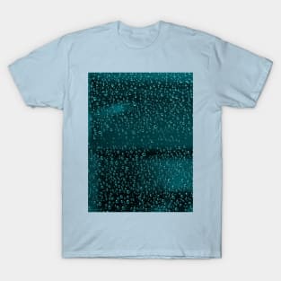 Shimmering drops of water on a sheet of glass T-Shirt